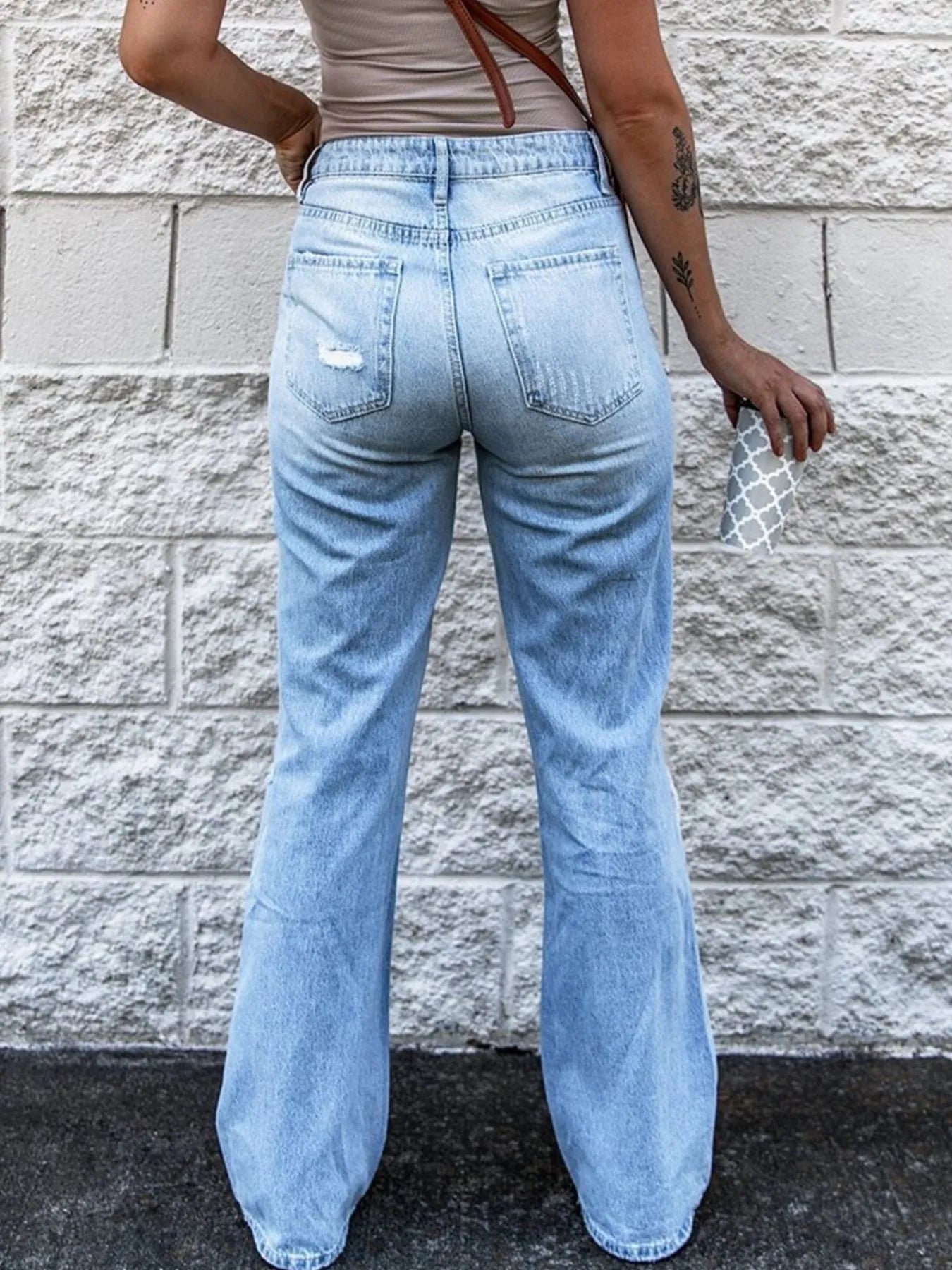 High Waist Distressed Jeans - Premium Pants from Trendsi - Just $30.57! Shop now at Craftklart.store