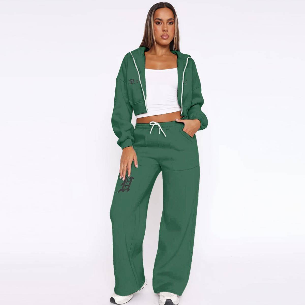 Women’s fleece tracksuit by Yoycol featuring a comfortable, stylish design with a fitted top and matching jogger pants.