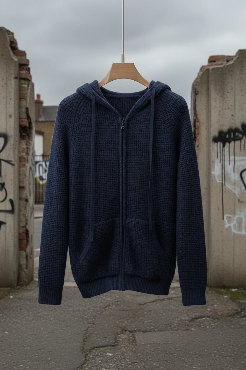 Urban casual knitted hooded cardigan in 100% pure cashmere, displayed in a cozy, stylish fit with a front zipper and hood.