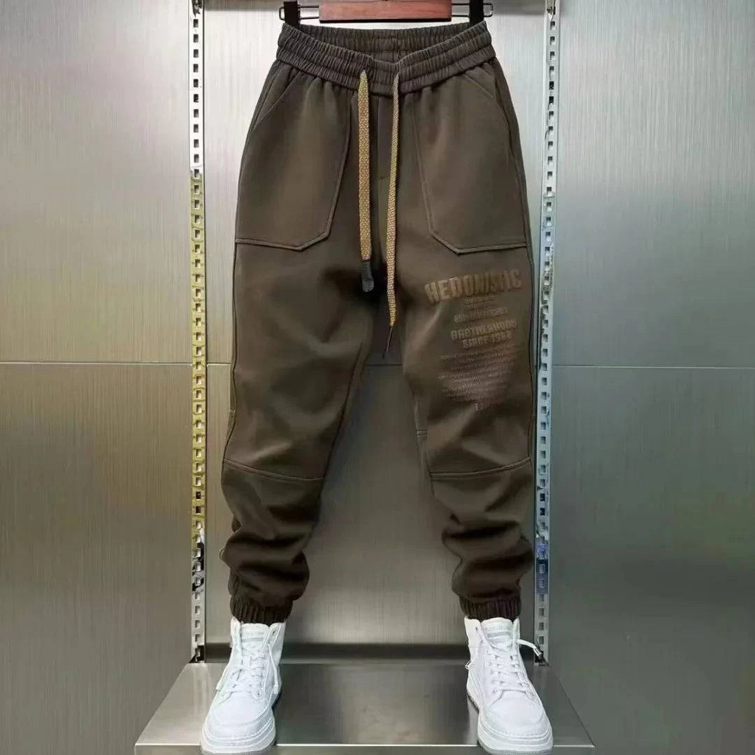 Urban casual men's joggers by Craftklart with edgy streetwear style, featuring comfortable fit and modern design.