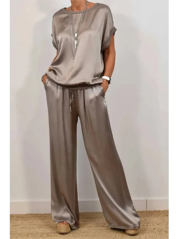 Women's Satin O-neck Short Sleeve Top + Wide Leg Pant Casual Loose Set - Premium Sets from Craftklart Dropship - Just $11.53! Shop now at Craftklart.store