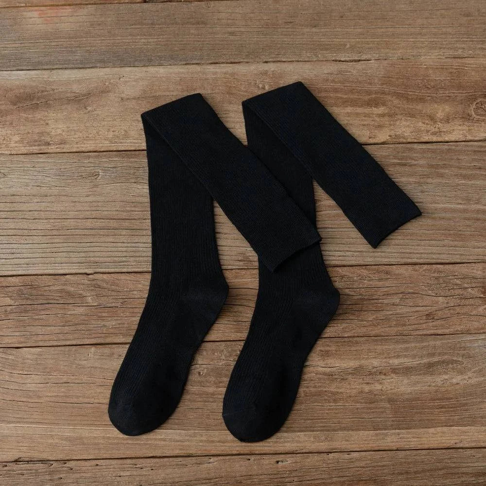 Japanese style cotton knee-high socks in solid color, long socks from Craftklart, featuring a smooth, comfortable fit.