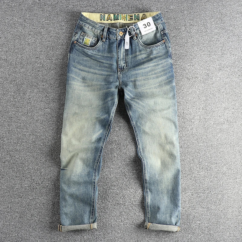 Men's tapered loose washed denim jeans by Craftklart Dropship, showing the relaxed fit, faded wash, and classic denim texture.