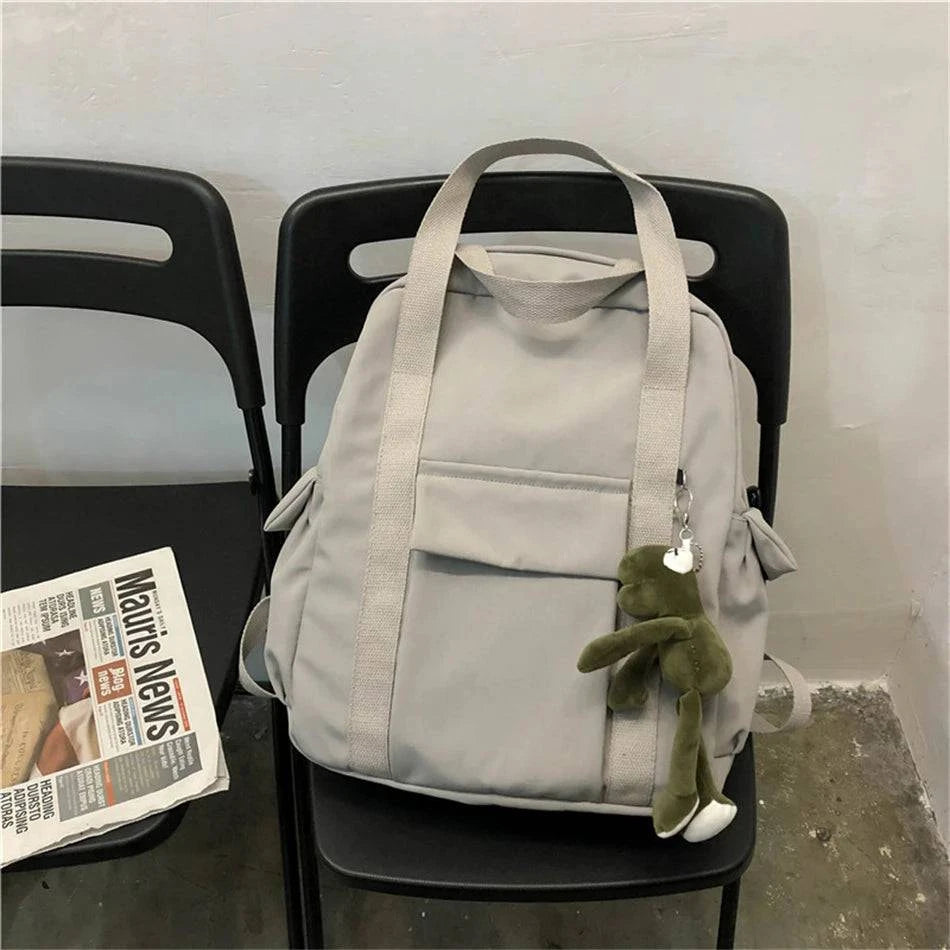 Urban Girlz waterproof nylon backpack by Craftklart Dropship with multiple compartments and adjustable straps.