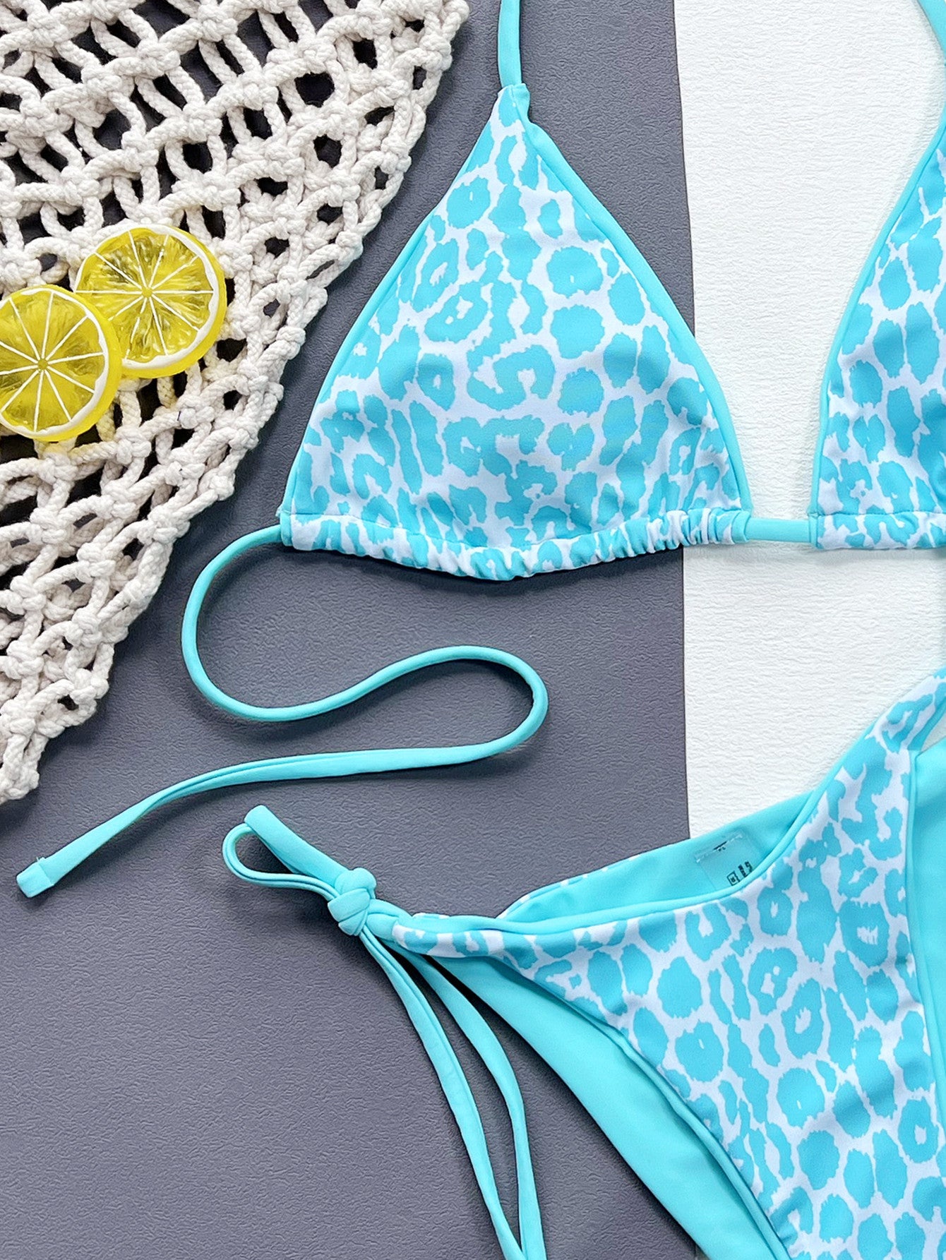 Leopard Print Halter Neck Tie Side Bikini Set - Premium Bikini from Trendsi - Just $18.25! Shop now at Craftklart.store