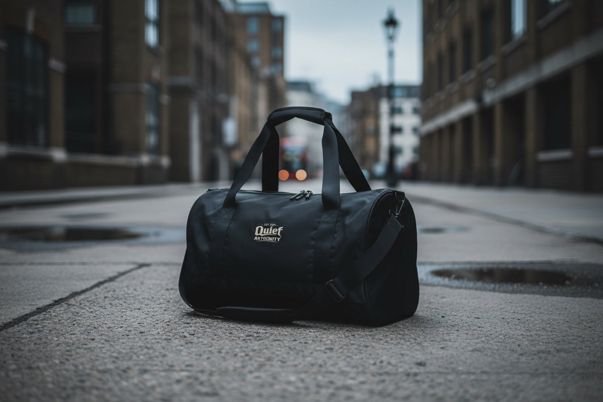 White Craftklart Quiet Authority gym bag with all-over print, featuring sturdy handles and spacious main compartment for workout gear.