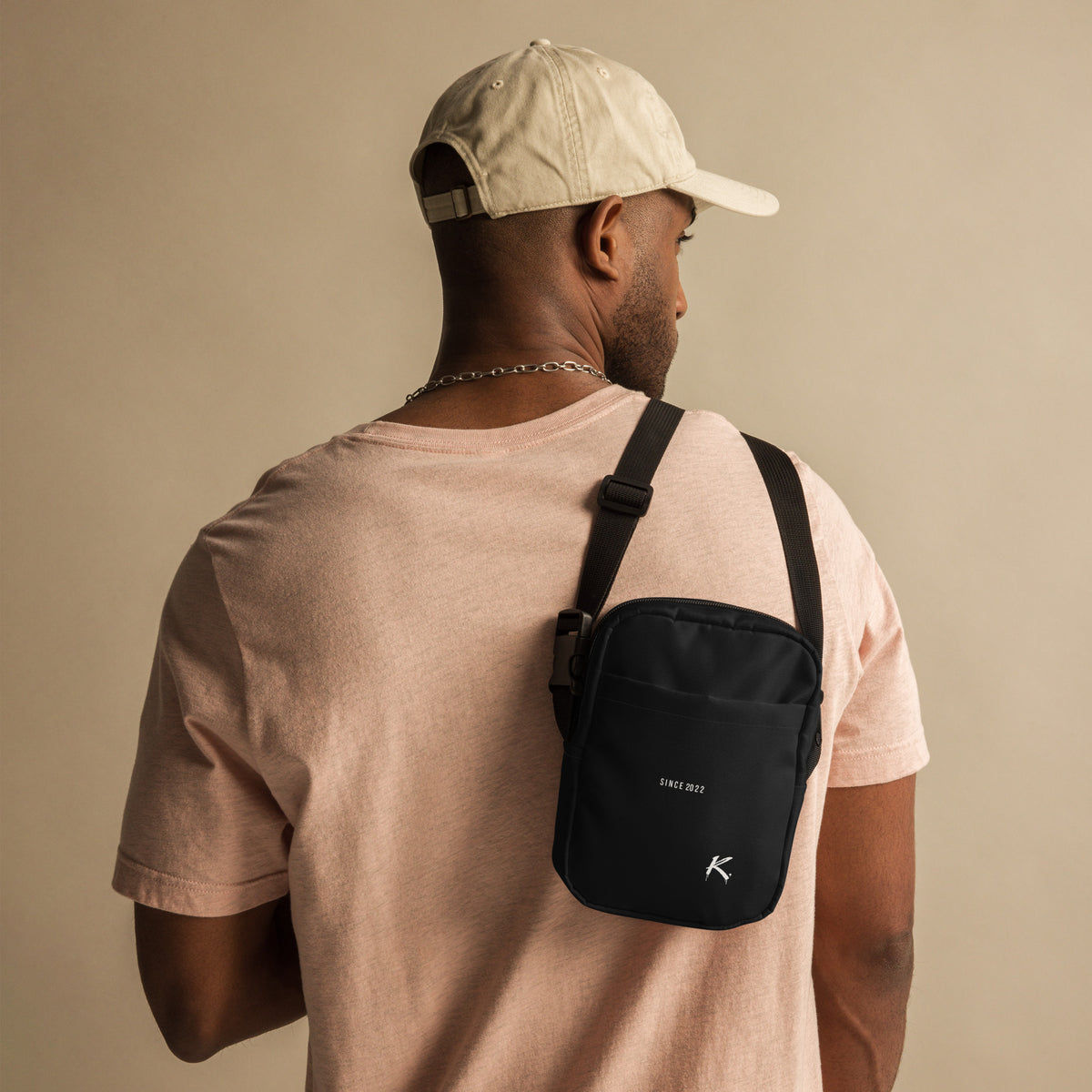 ODMPOD Urban Form Utility Crossbody Bag with all-over print, white fabric, front view, functional design for bags and accessories.
