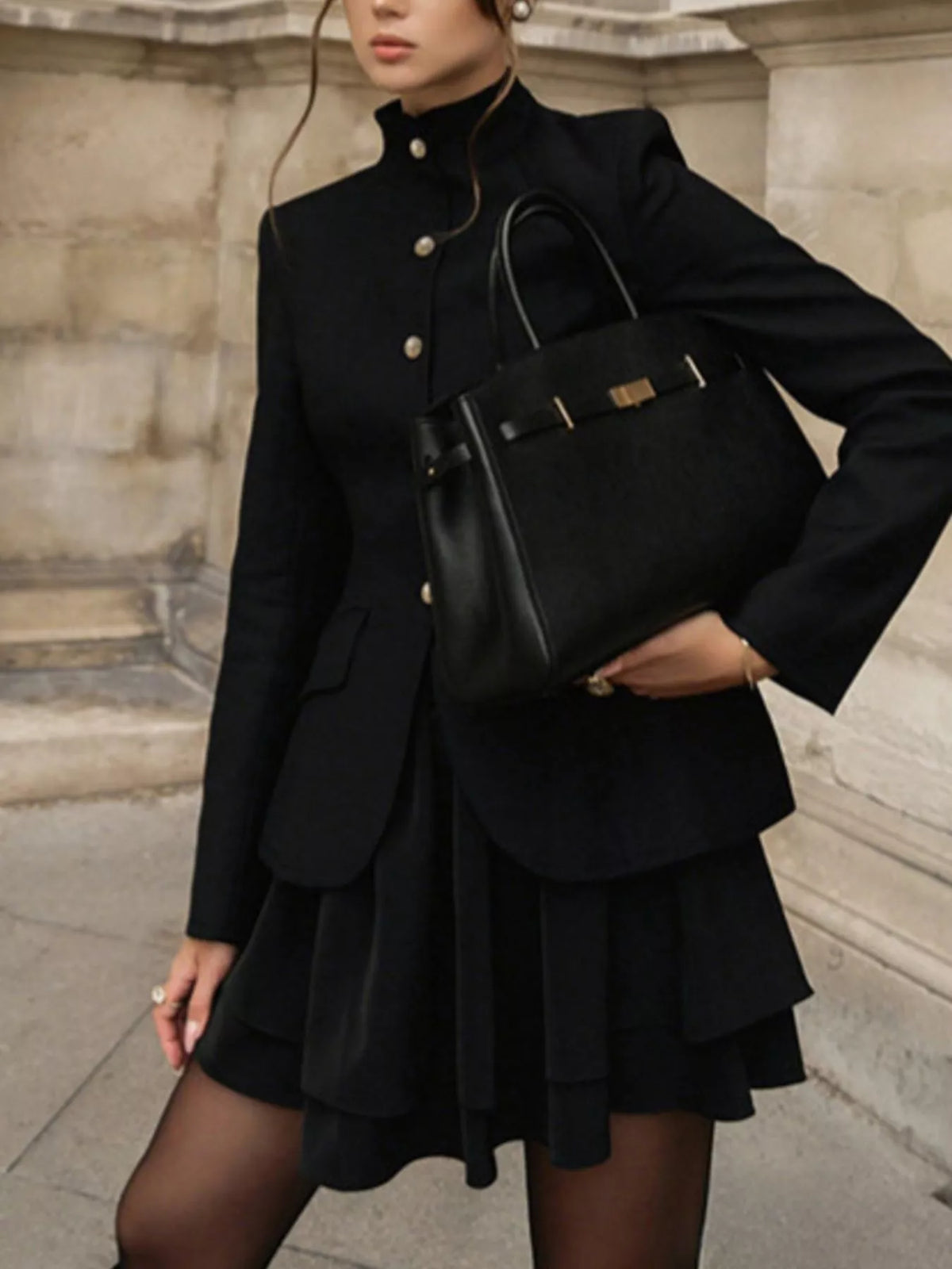 Elegant stand collar blazer and mini skirt set by Trendsi, shown on a model, featuring a tailored fit and sophisticated style.