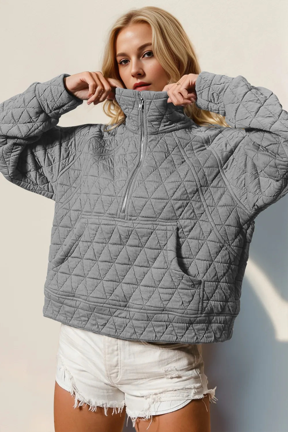 Double Take Half Zip Long Sleeve Quilted Sweatshirt with Pocket - Premium Bomber Jacket from Trendsi - Just $31.76! Shop now at Craftklart.store