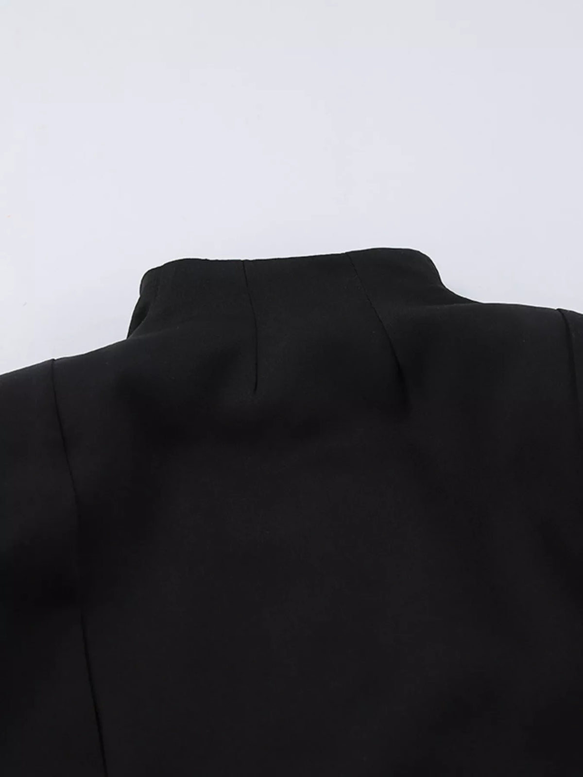 Elegant stand collar blazer and mini skirt set by Trendsi, featuring a stylish dress with tailored fit and sophisticated design.