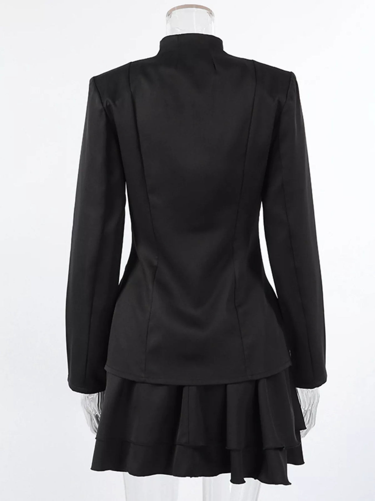 Elegant stand collar blazer and mini skirt set by Trendsi, showing a stylish dress with tailored blazer and matching skirt.