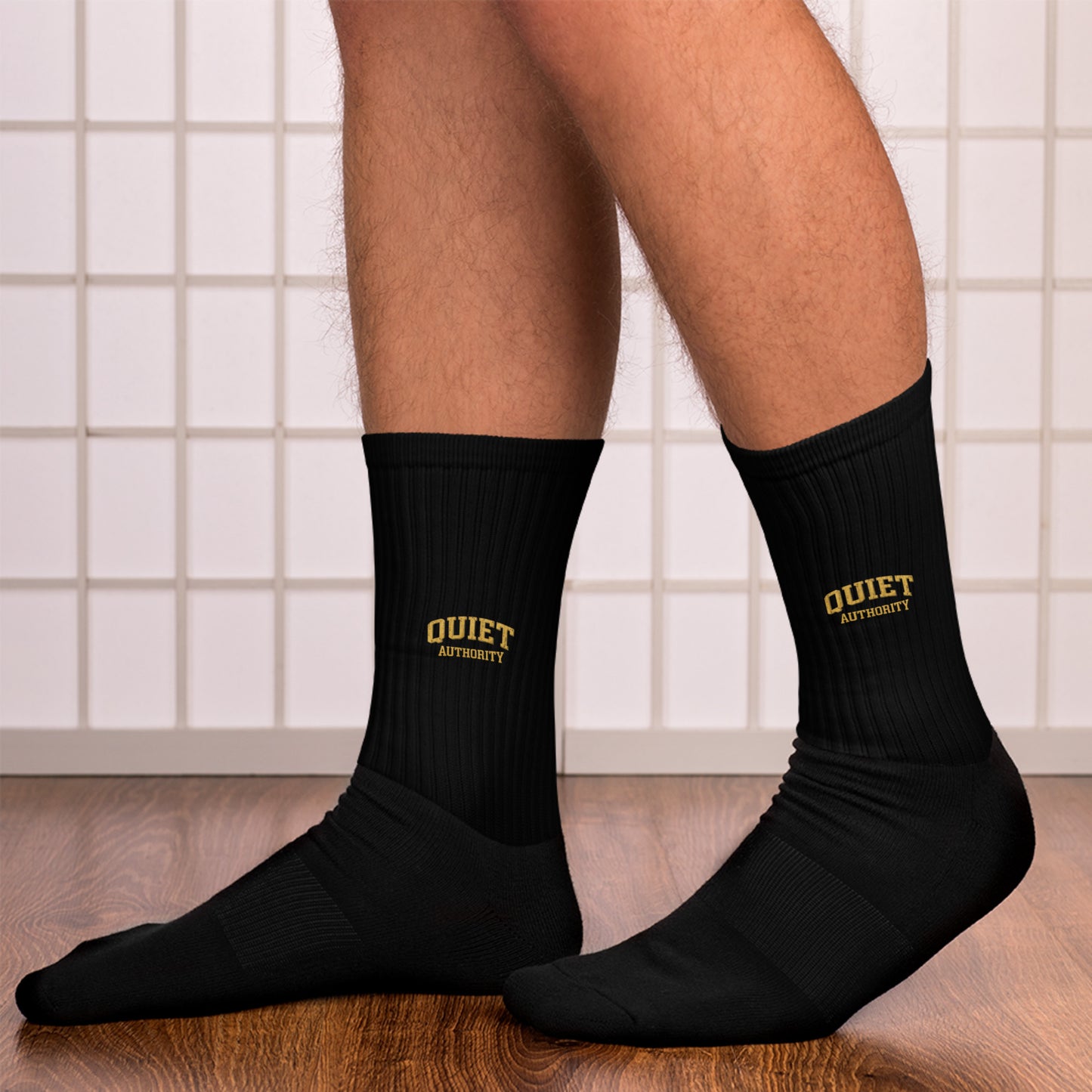 Black Craftklart Quiet Authority crew socks with vibrant sublimated print, soft, comfortable, and suitable for casual wear.