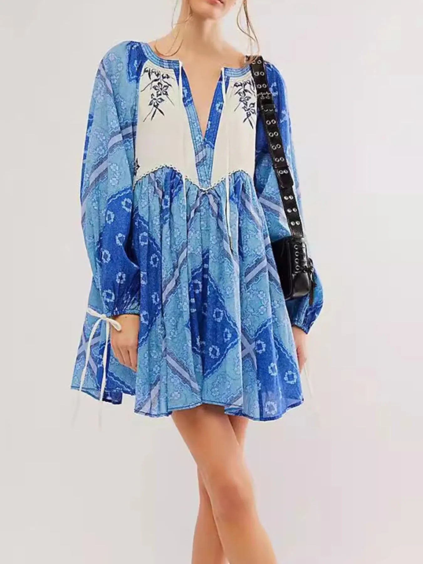 Printed Tie Neck Long Sleeve Dress - Premium Dress from Trendsi - Just $30.70! Shop now at Craftklart.store