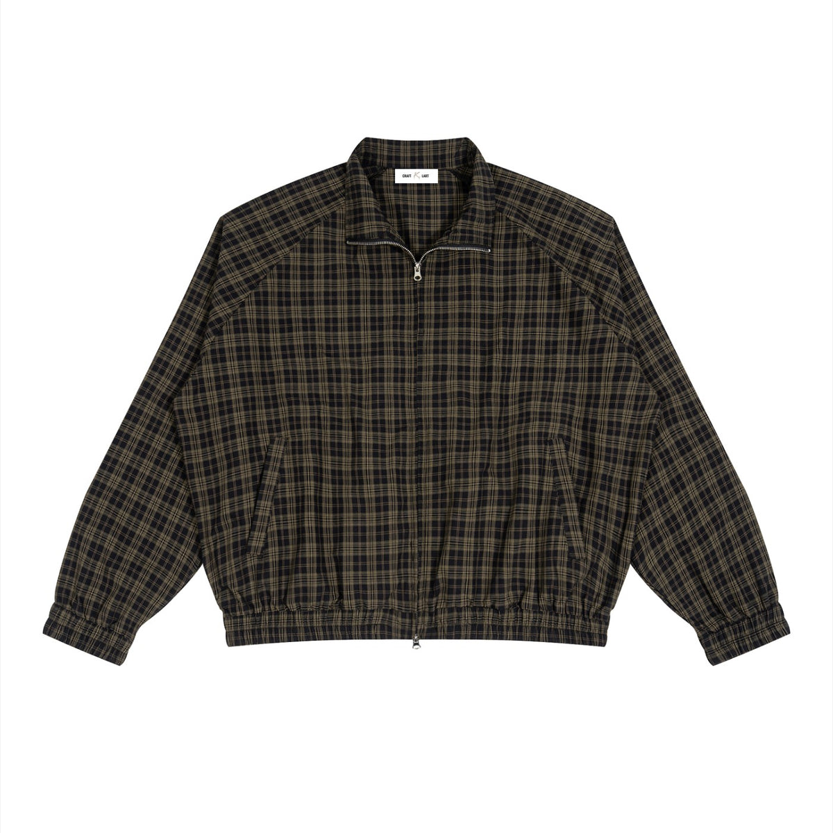 Black plaid ODMPOD full-zip track jacket with urban streetwear style, featuring a casual fit and sporty design.