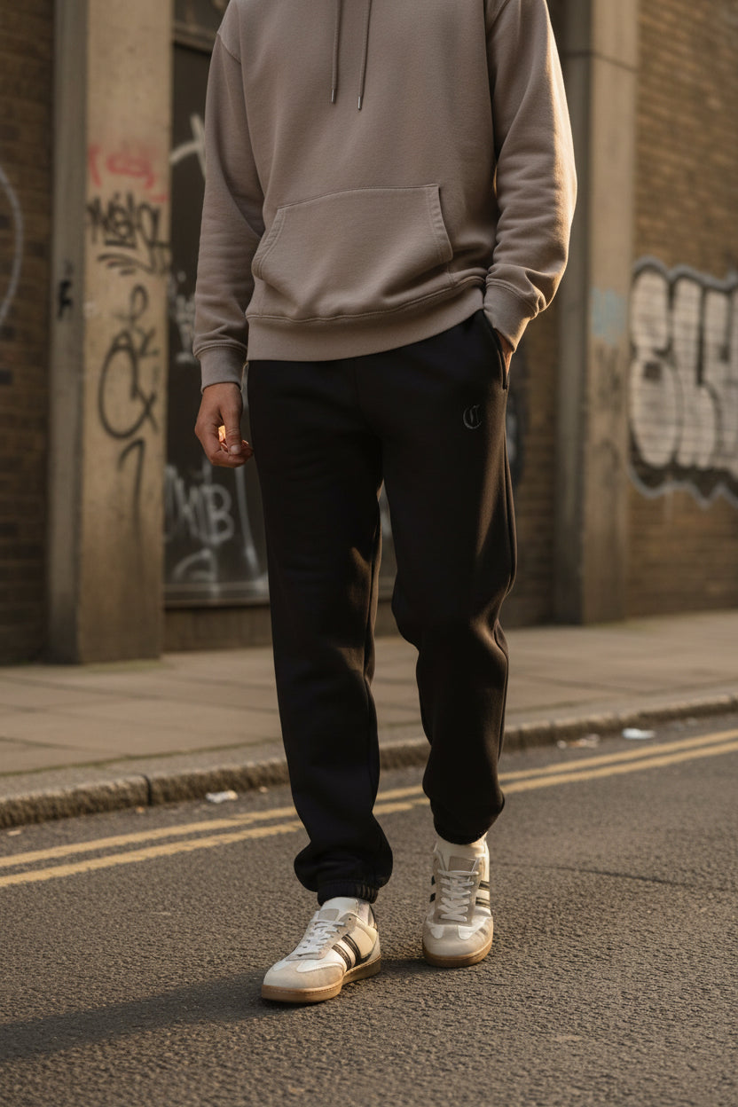 Black heavyweight CKL Urban Authority sweatpants with relaxed fit fleece joggers for urban streetwear style.