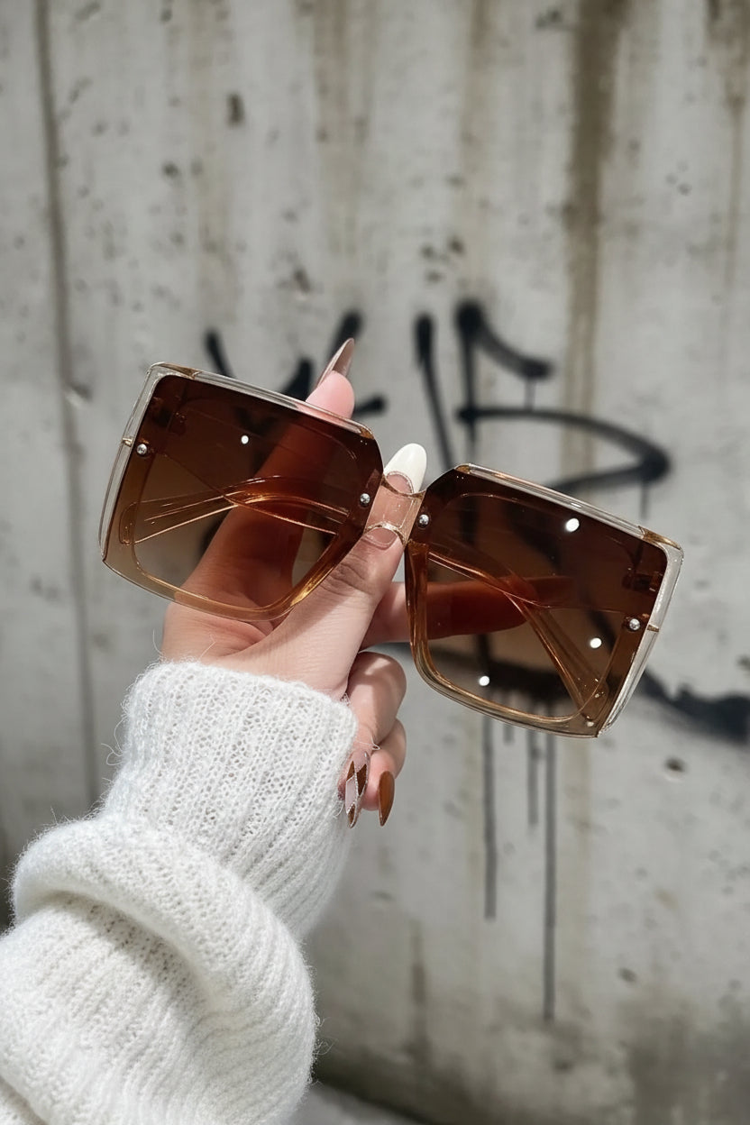 Urban Fashion & Streetwear | Craftklart oversized square sunglasses with brown gradient lenses and clear frames.