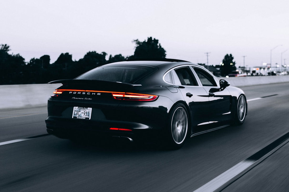 Custom street car in a West Coast garage — chop shop culture meets streetwear