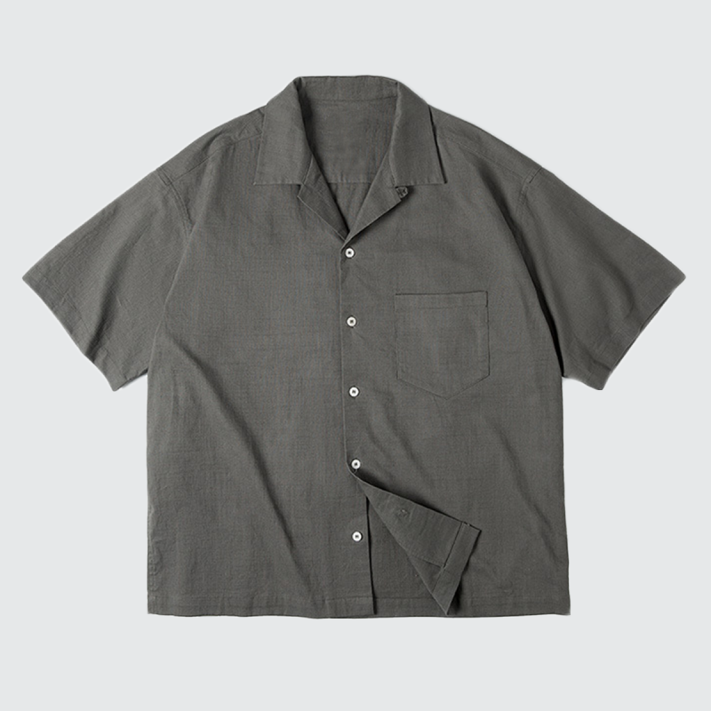 Urban Fashion & Streetwear Cuban Collar Short-Sleeve Shirt with vibrant pattern and relaxed fit, displayed on a hanger.