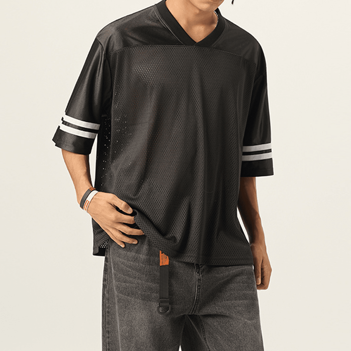 Black contrast cut-out V-neck T-shirt by Craftklart with oversized fit, made from 240GSM fabric, styled with streetwear fashion.