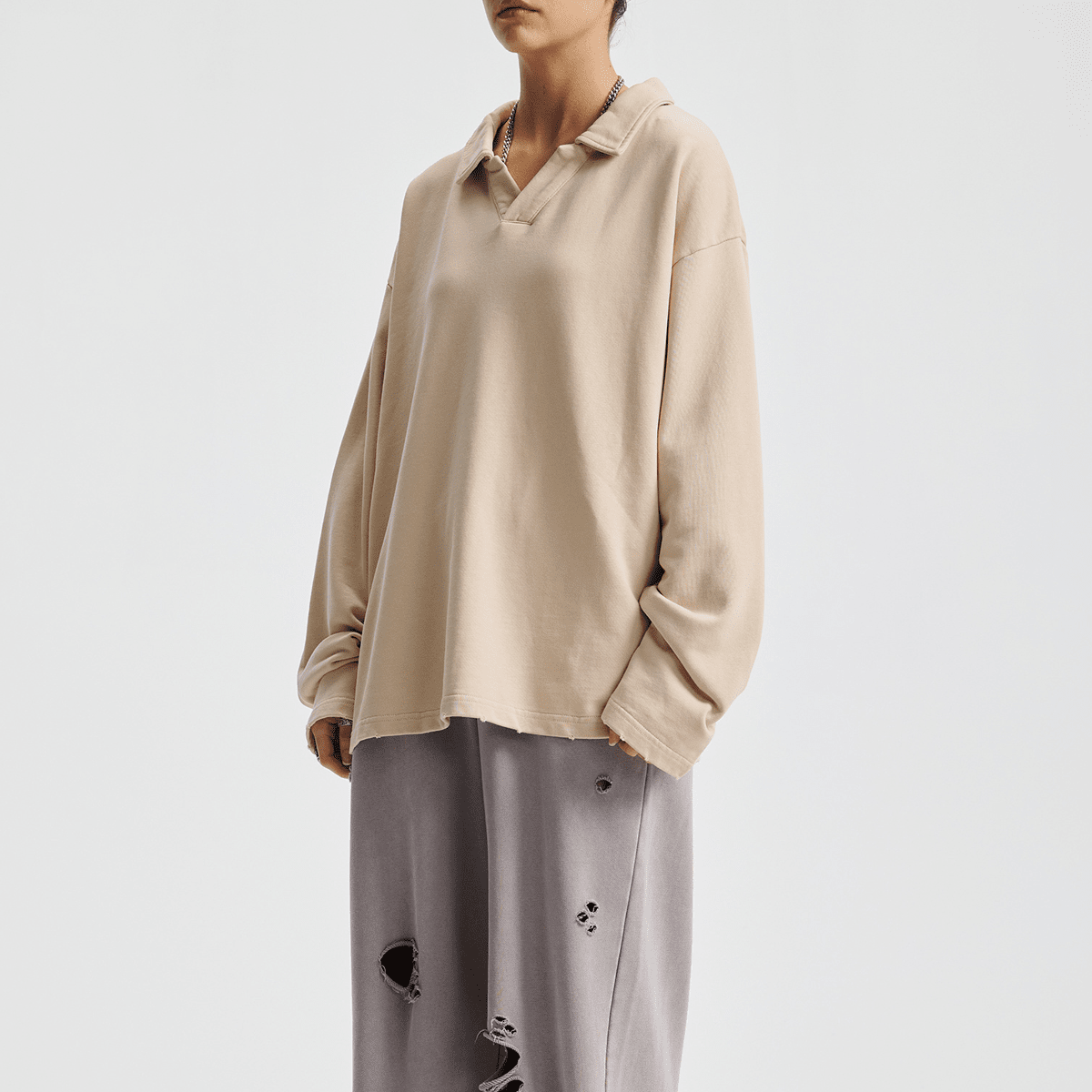 Oversized heavyweight long-sleeve collared shirt from Urban Fashion & Streetwear by Craftklart, showing a relaxed fit with a collar and long sleeves.