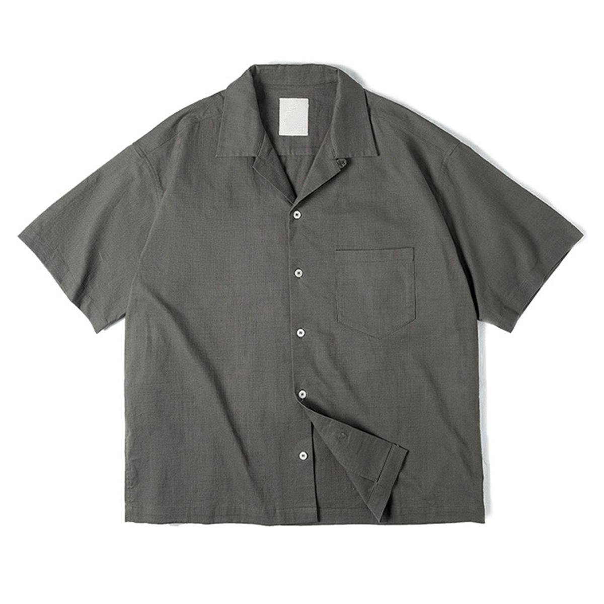 Urban Fashion & Streetwear Cuban collar short-sleeve shirt with vibrant pattern, casual style, and lightweight fabric.