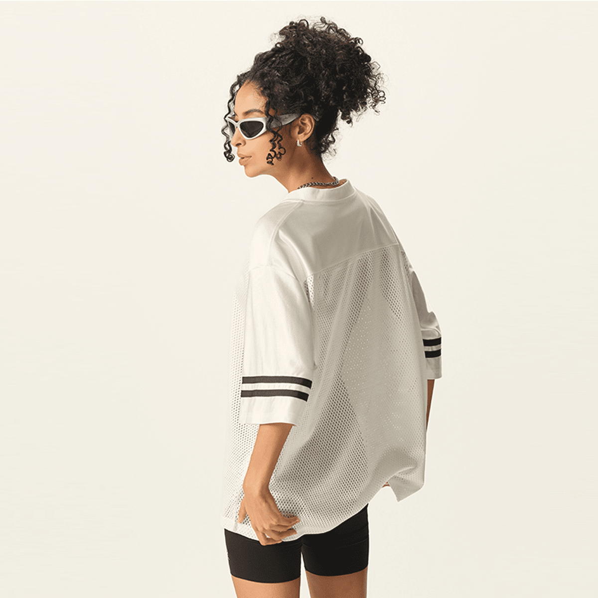 Urban Fashion & Streetwear Contrast Cut-Out V-Neck T-Shirt, oversized fit, 240GSM, black with stylish cut-out design.