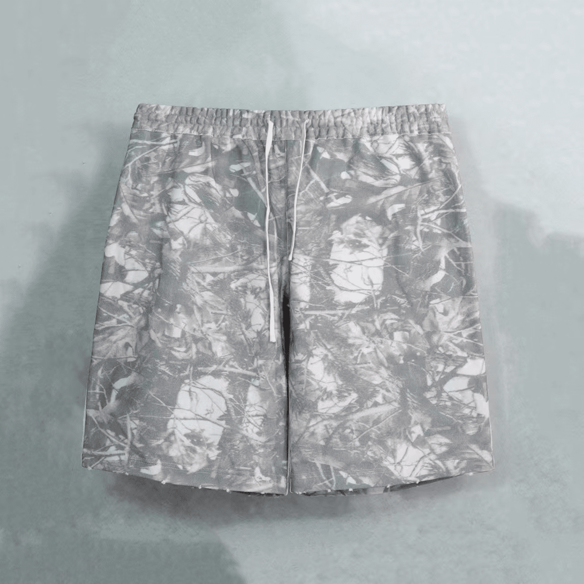 French Terry Camo Shorts by Craftklart featuring a 400GSM fabric, stylish camouflage pattern, and comfortable streetwear design.