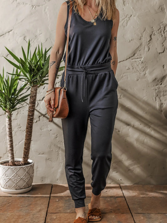 Tie Waist Sleeveless Jogger Jumpsuit - Premium Jumpsuit from Trendsi - Just $35.08! Shop now at Craftklart.store