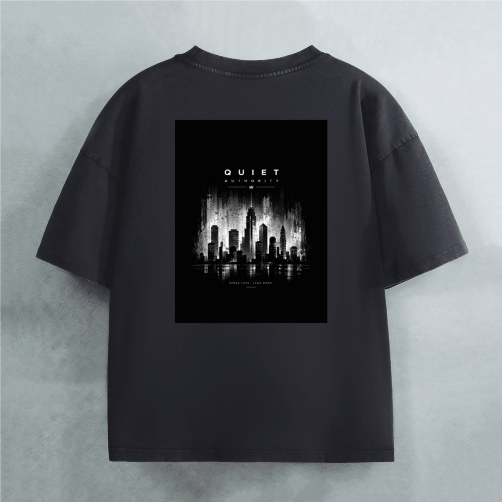 Back view of Craftklart heavyweight snow-wash oversized printed T-shirt in black, featuring bold graphic design and urban streetwear style