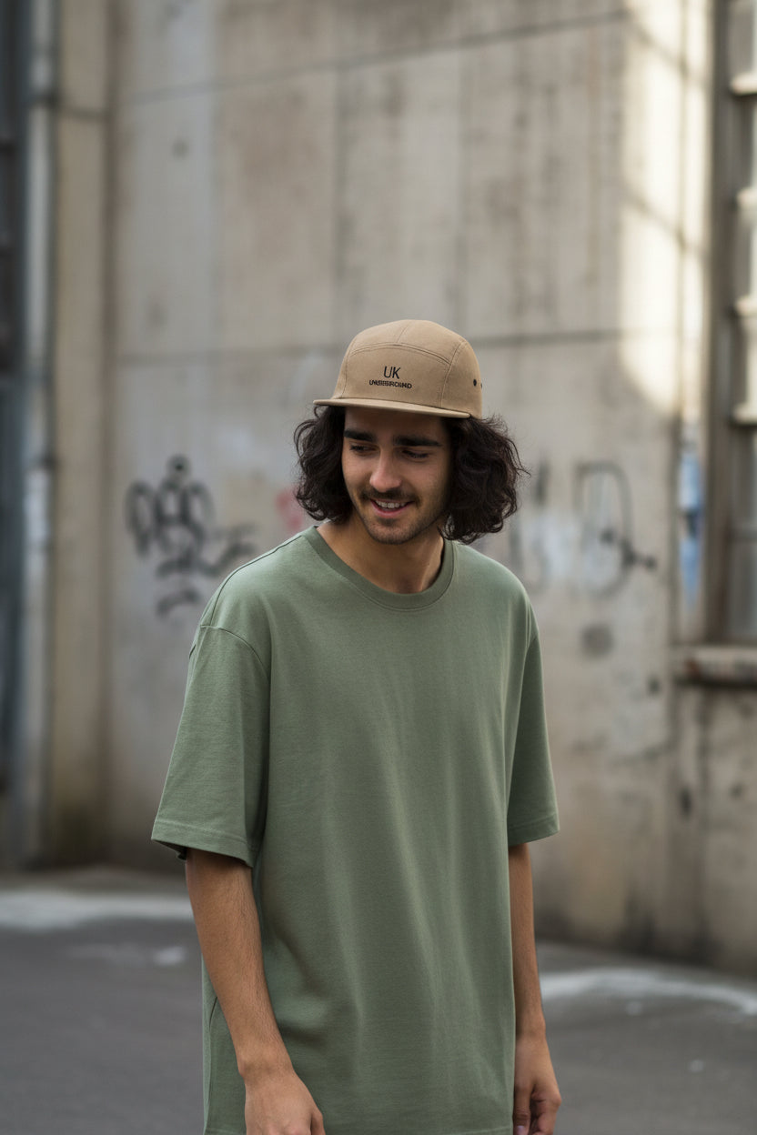 Khaki UK Underground Five Panel Cap by Urban Fashion & Streetwear, featuring a front view with adjustable strap and branding details.