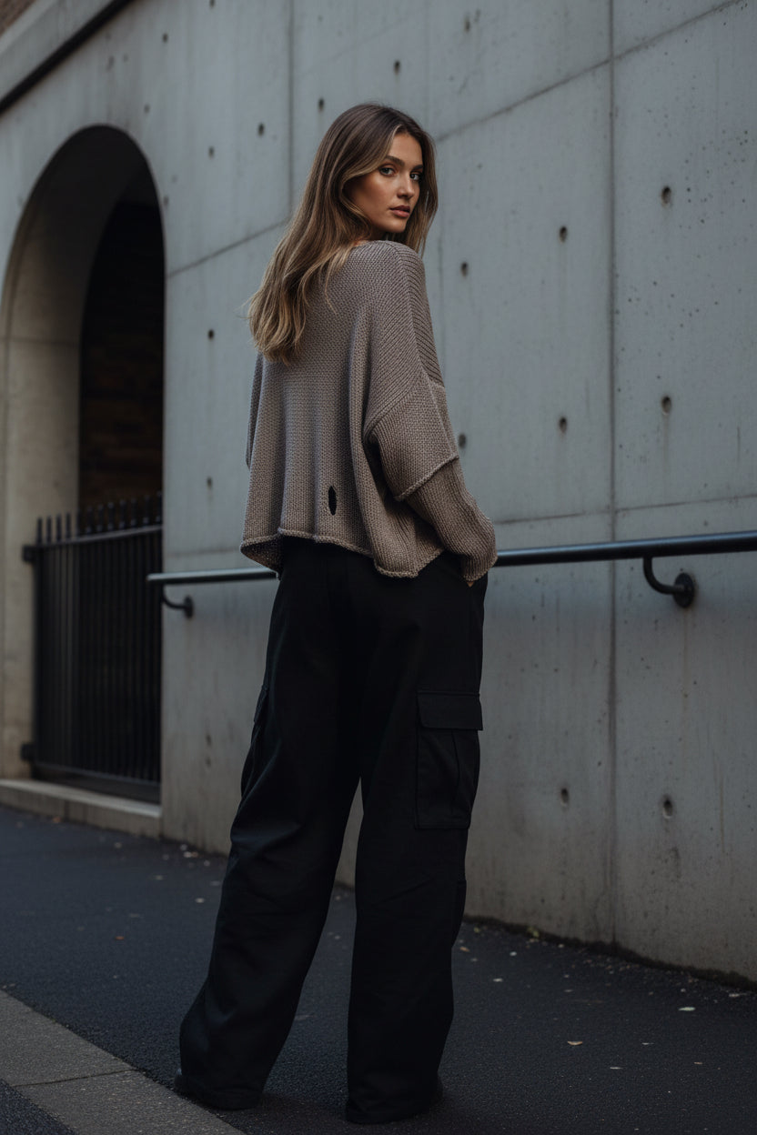 Urban Fashion & Streetwear knit sweater with cutout 3/4 sleeves, minimal structured knitwear in a stylish, modern design.