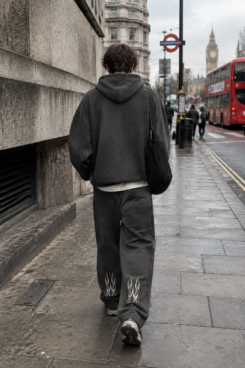 ODMPOD Craftklart Mineral Wash Barrel Pants showing relaxed fit, stone-washed fabric, and detailed waistband in a natural pose.