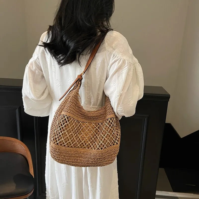 Woven Straw Crescent Shoulder Bag - Premium Bag from Trendsi - Just $23.90! Shop now at Craftklart.store