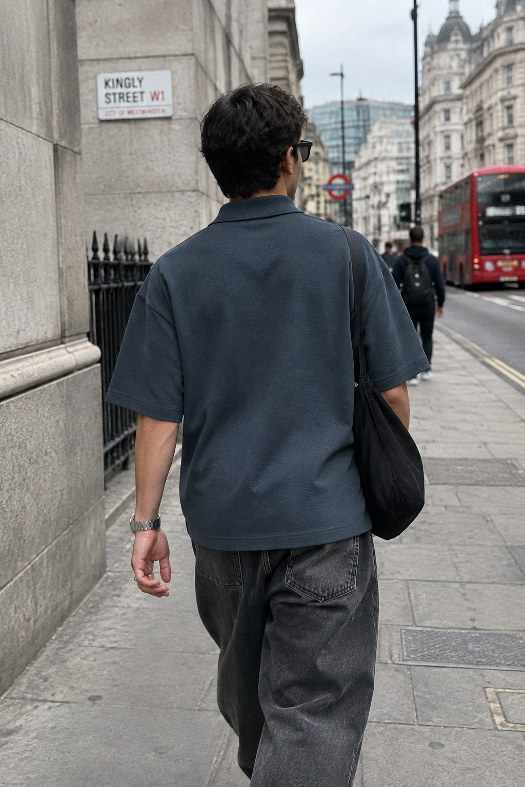 ODMPOD 250GSM drop shoulder polo shirt in a classic design, featuring a relaxed fit and comfortable fabric.