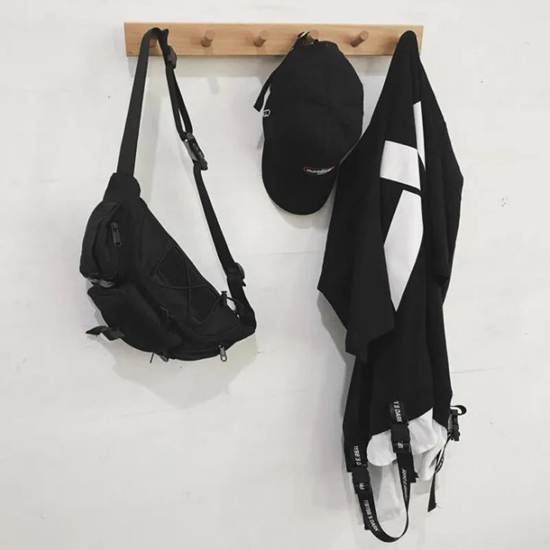 Unisex tactical crossbody chest bag with multiple compartments, urban style, crafted by Craftklart for streetwear and everyday use.