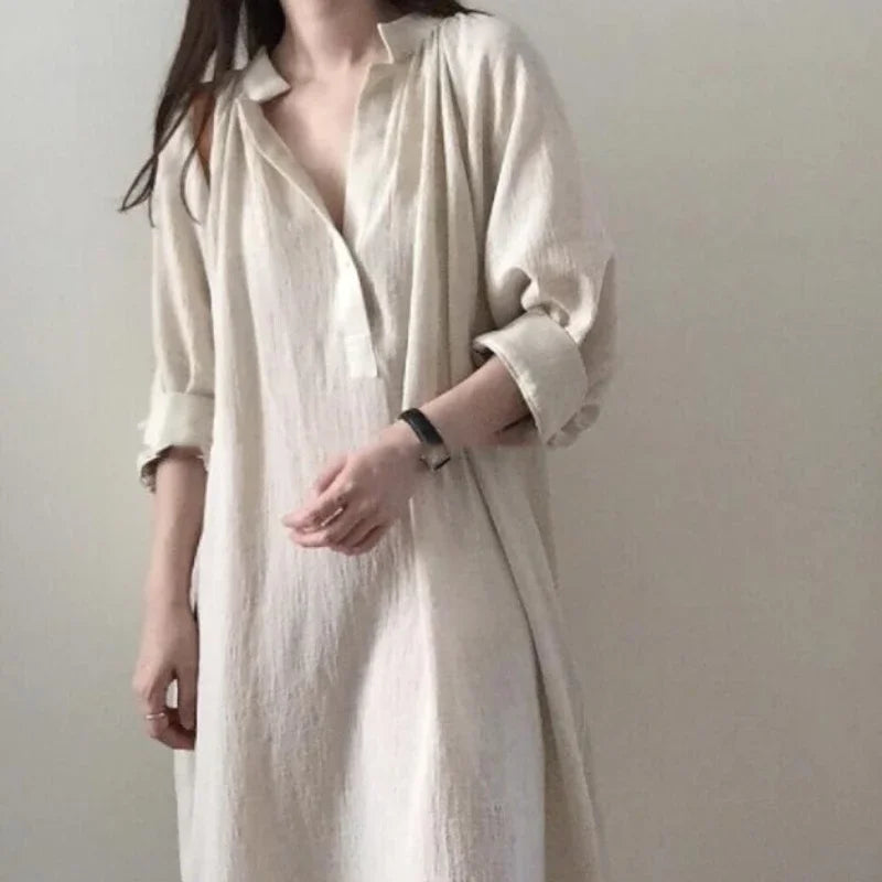 Women's V-neck baggy sundress, Korean midi beach dress by Craftklart Dropship, featuring a relaxed fit and lightweight fabric.