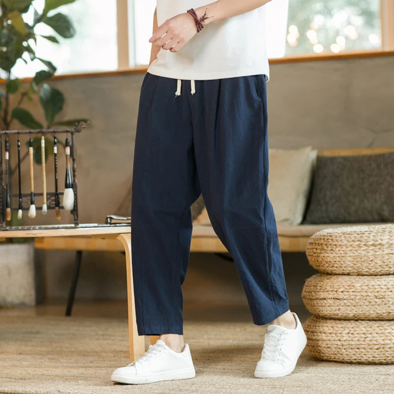 Craftklart men's loose fit drawstring trousers featuring a casual streetwear style with adjustable waist and relaxed fit for comfort.