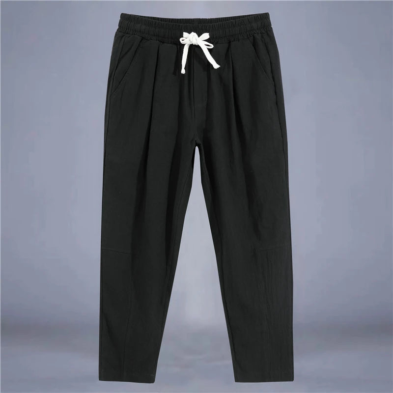 Craftklart men's loose fit streetwear trousers with drawstring waist, casual and comfortable design, shown in the product image.