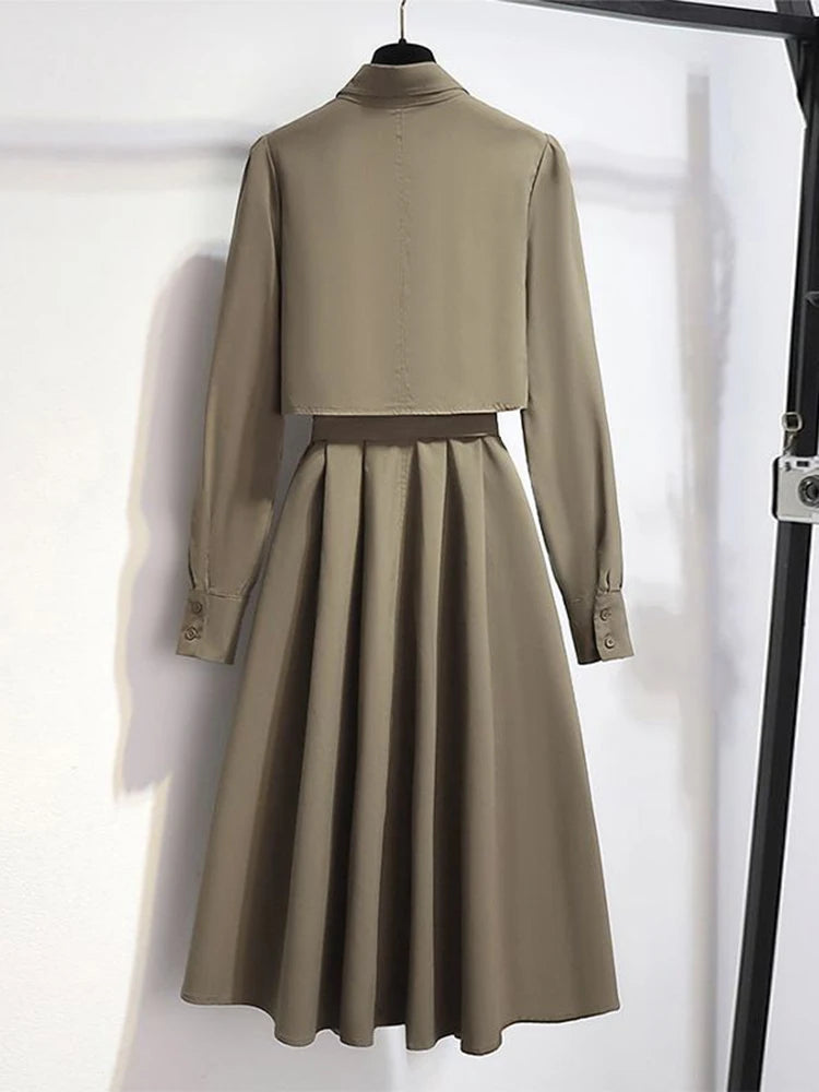 Women's long sleeve belted midi dress from Craftklart Dropship, featuring a flowing silhouette and stylish design.