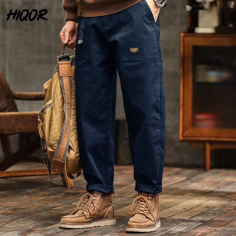 Craftklart men's cargo trousers with a loose fit, utility streetwear style, featuring multiple pockets and durable fabric.