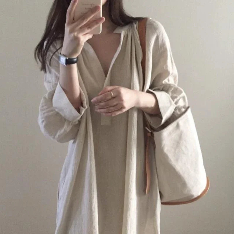 Women's V-neck baggy sundress by Craftklart Dropship, featuring a Korean midi beach dress style with a relaxed fit and V-neck design.