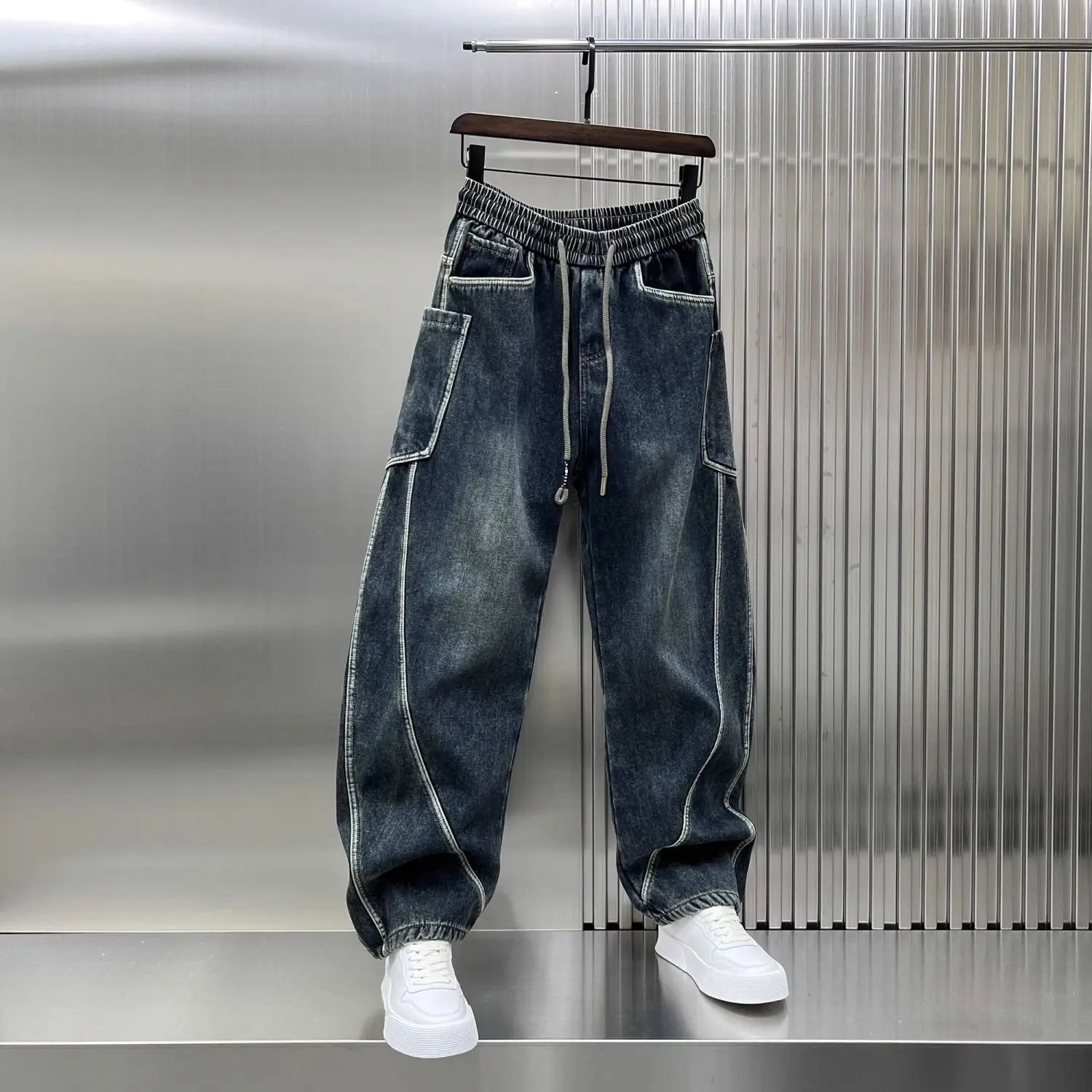 Craftklart men's wide-leg denim jeans with elastic waist, streetwear style, shown in a front view.