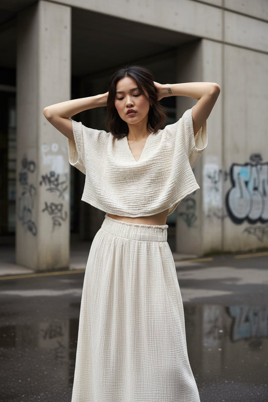 Loose-fitting oversized V-neck cotton tee by Craftklart Dropship, shown in a relaxed fit with soft fabric and simple style.