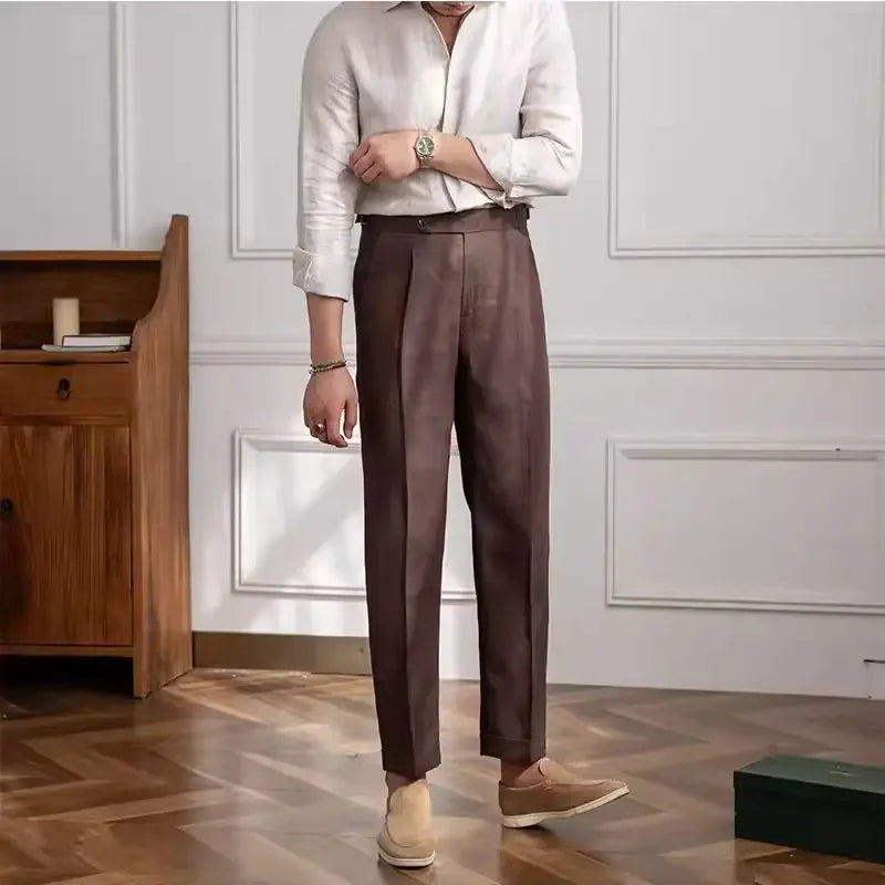 Light beige linen trousers from Craftklart's The Linen Trouser collection, featuring a relaxed fit and side pockets.