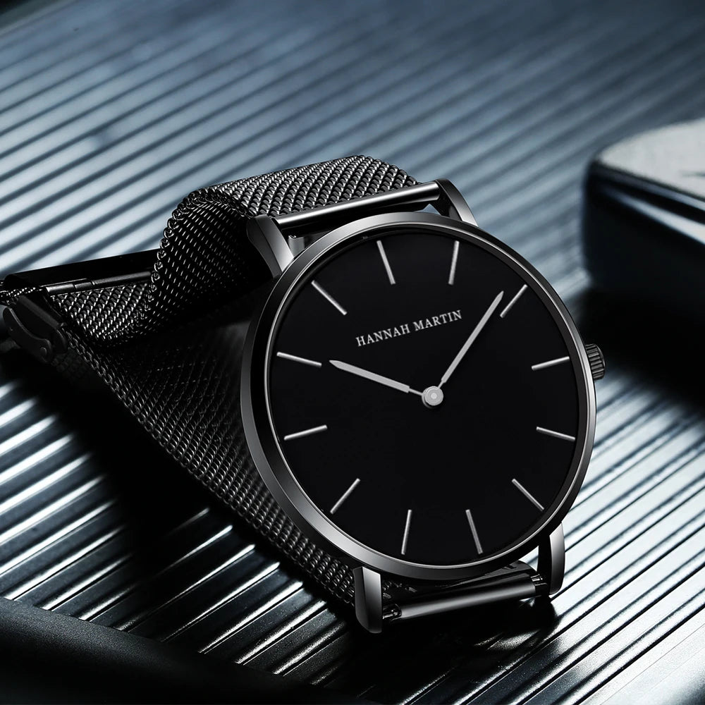 Minimal Quartz Watch by Craftklart with stainless steel band, featuring a sleek, modern design on a neutral background.
