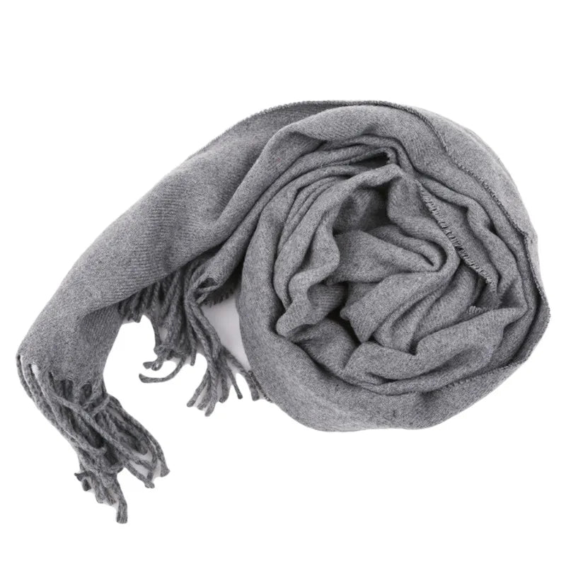 Stillline fringed scarf by Craftklart Dropship, a soft textured accessory with decorative fringe edges