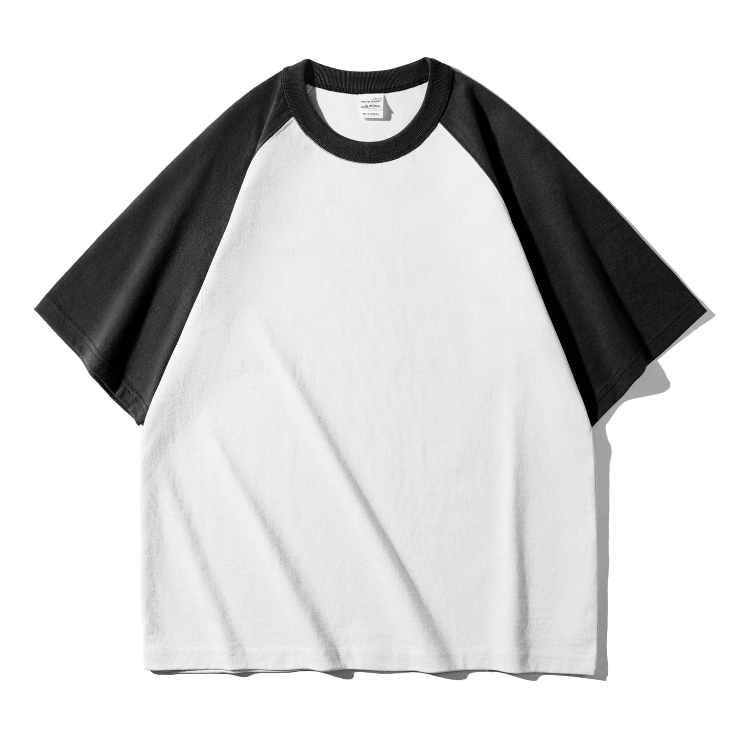 Color-blocked Craftklart Dropship oversized 300GSM t-shirt worn with intention, showcasing bold design and relaxed fit.