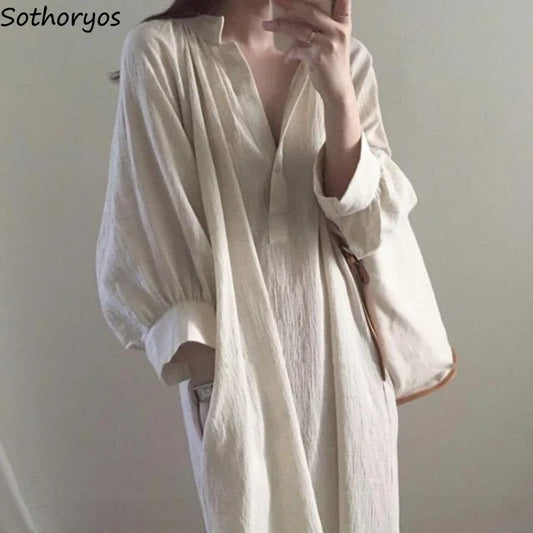 Women's V-neck baggy sundress by Craftklart Dropship, Korean midi beach dress with flowy fit and casual style.
