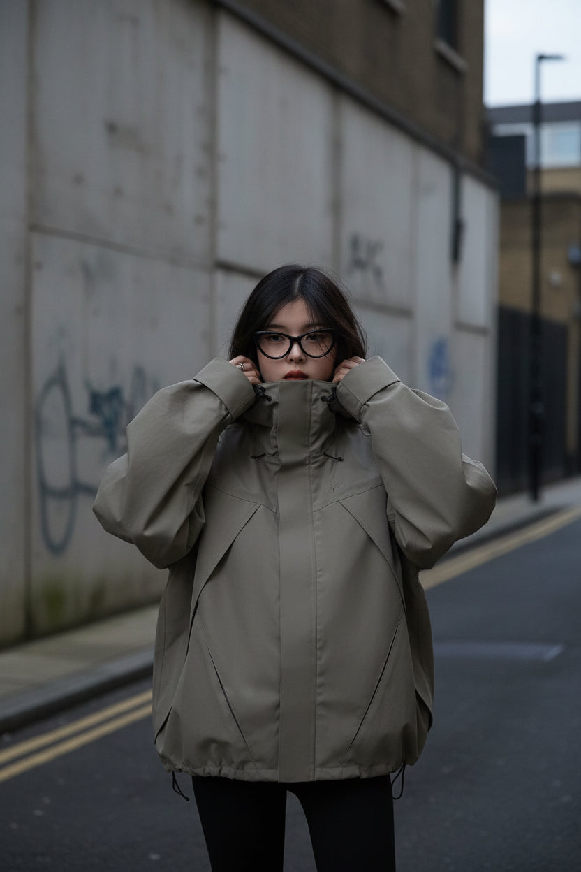 Women’s hooded windproof jacket by Craftklart, oversized streetwear coat with a hood, designed for outdoor protection and style.