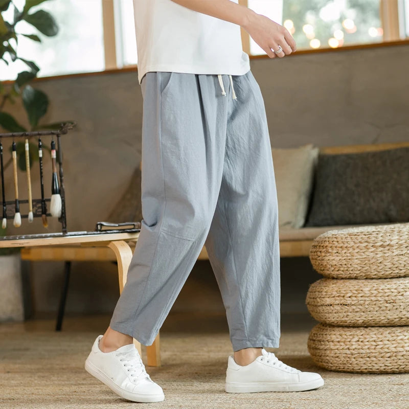 Craftklart men's loose fit drawstring trousers, streetwear style, shown with relaxed fit and casual design.